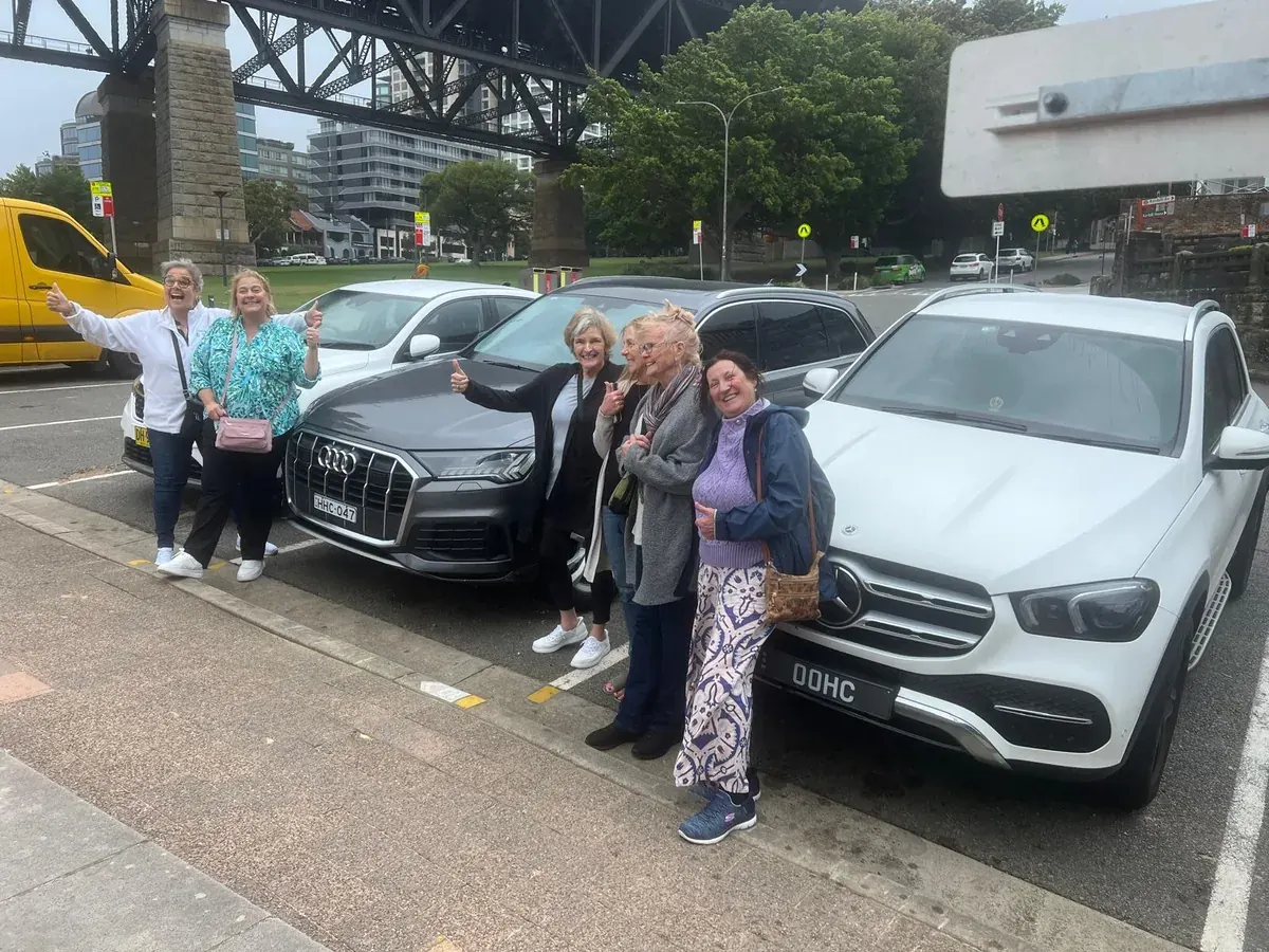 Group enjoying a private Sydney transfer with Harmony Rides