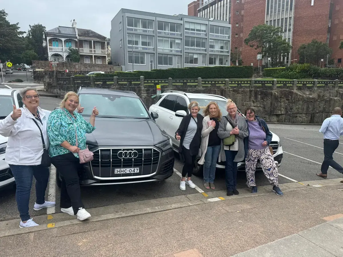 Happy passengers with the Harmony Rides fleet
